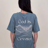 God Is Greater Unisex Tee in washed slate with mountain graphic on back — Paper Doll