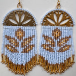 Lotus Fringe Earrings with powder-blue beadwork, gold lotus filigree, and gold fringe — Paper Doll