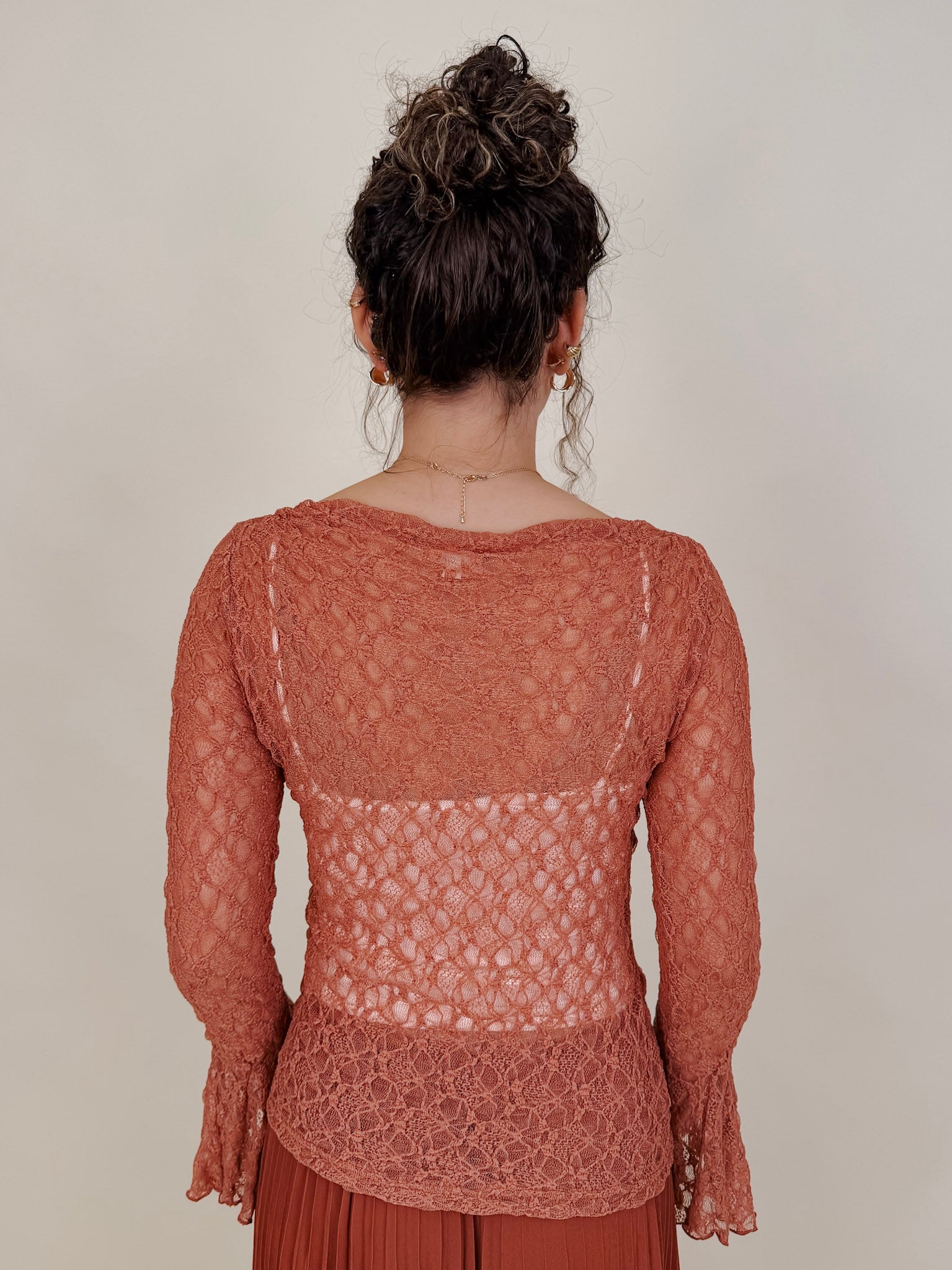 Sierra Casual Top in terracotta open lace knit with bell sleeves — Paper Doll