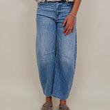 The Lovely Jean in light vintage wash denim with high rise barrel leg and raw hem — Paper Doll