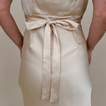 Isadora Satin Midi Dress in light yellow with lace trim and mesh flutter sleeves — Paper Doll
