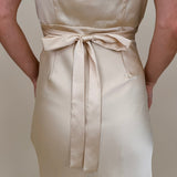 Isadora Satin Midi Dress in light yellow with lace trim and mesh flutter sleeves — Paper Doll