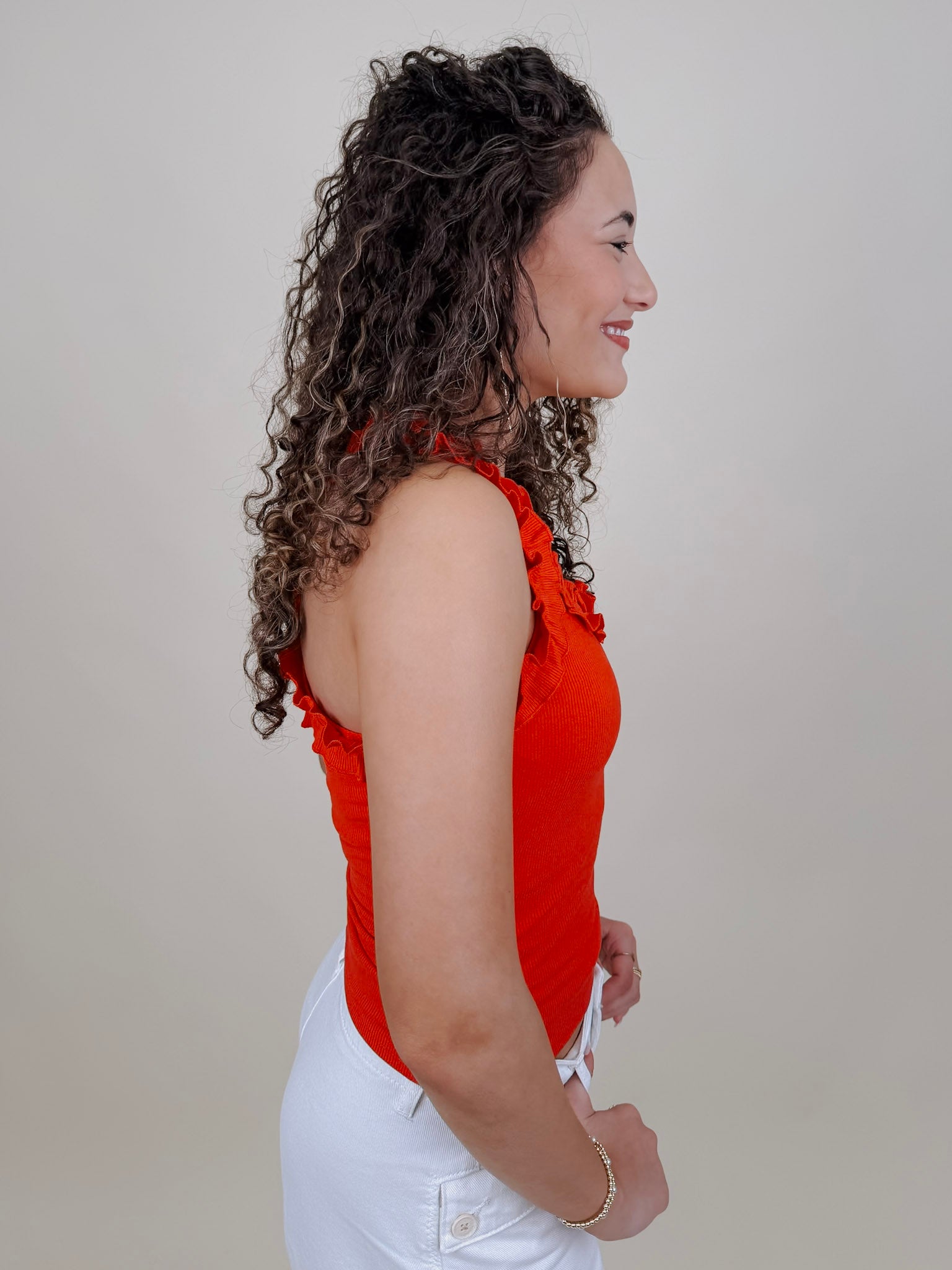 Tammy Ruffle Tank in red with a ruffle shoulder and neckline — Paper Doll