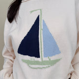 Sailboat Sweater with cream knit and navy and blue intarsia sailboat graphic — Paper Doll
