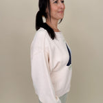 Sailboat Sweater with cream knit and navy and blue intarsia sailboat graphic — Paper Doll
