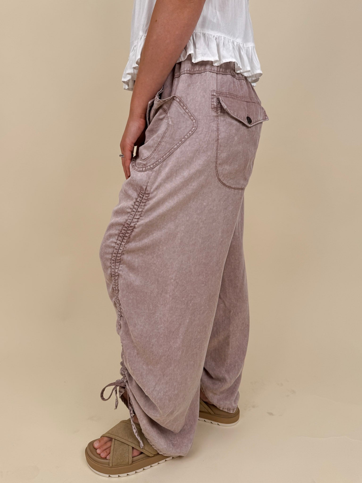 Kalista Cargo Pants in washed mauve with ruched drawstring hems and snap cargo pockets — Paper Doll
