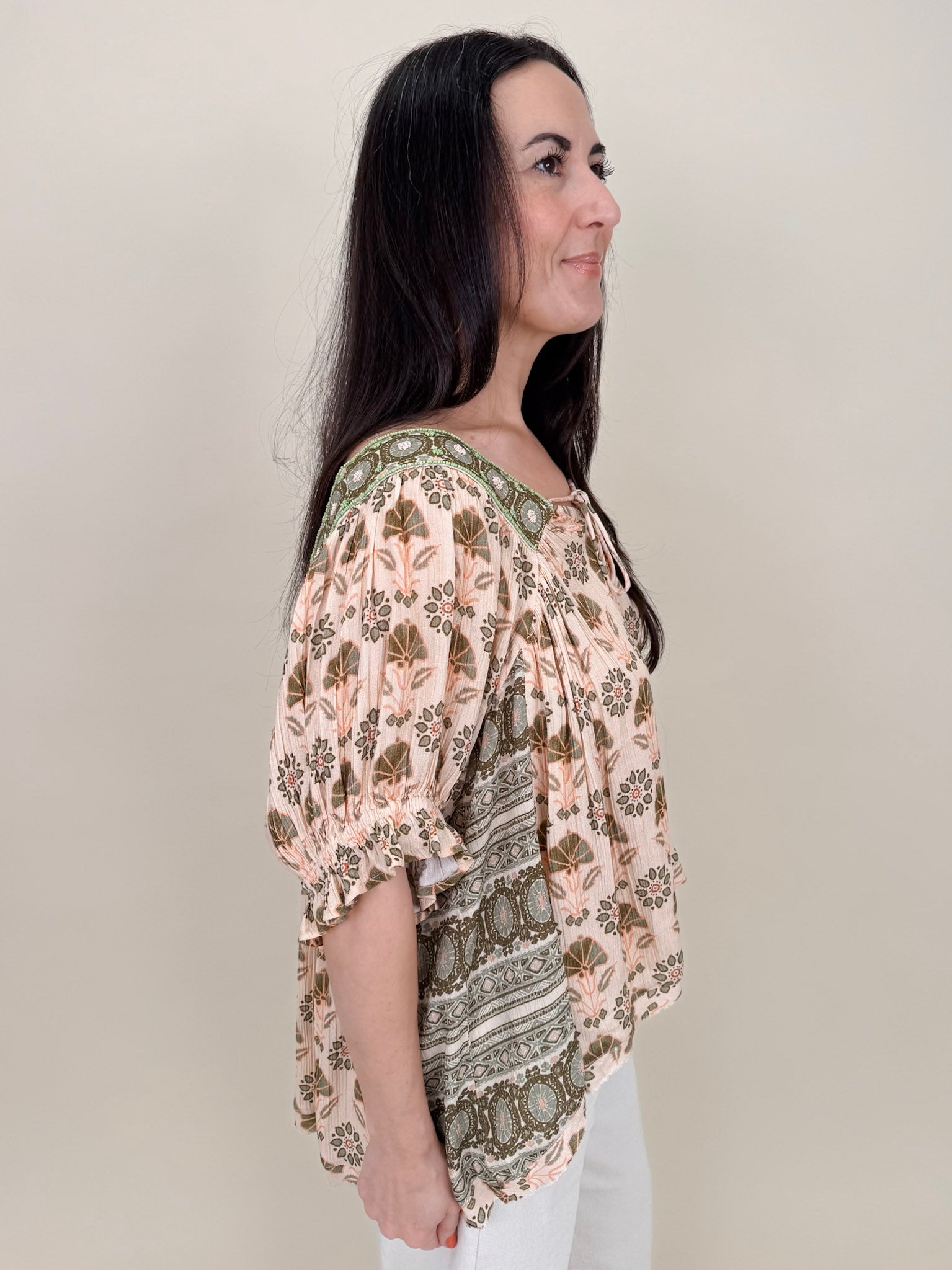 Kace Floral Boho Blouse in cream botanical print with embroidered yoke and smocked ruffle sleeves — Paper Doll
