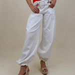 Lottie Boho Balloon Jean Pants in crisp white with cinch-tie balloon hem — Paper Doll
