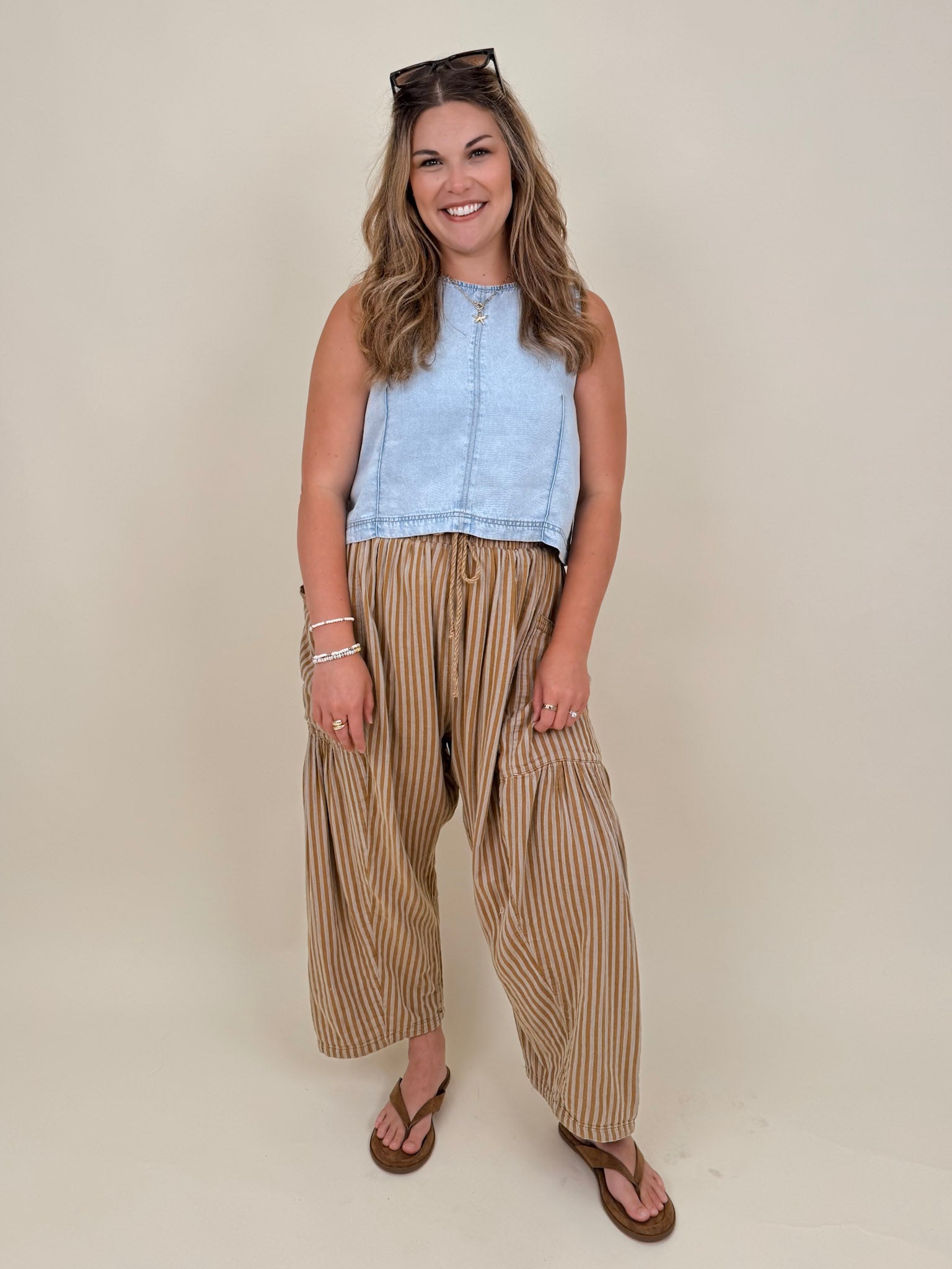 Zena Round Neck Top in light wash denim with a sleeveless cut and keyhole back — Paper Doll