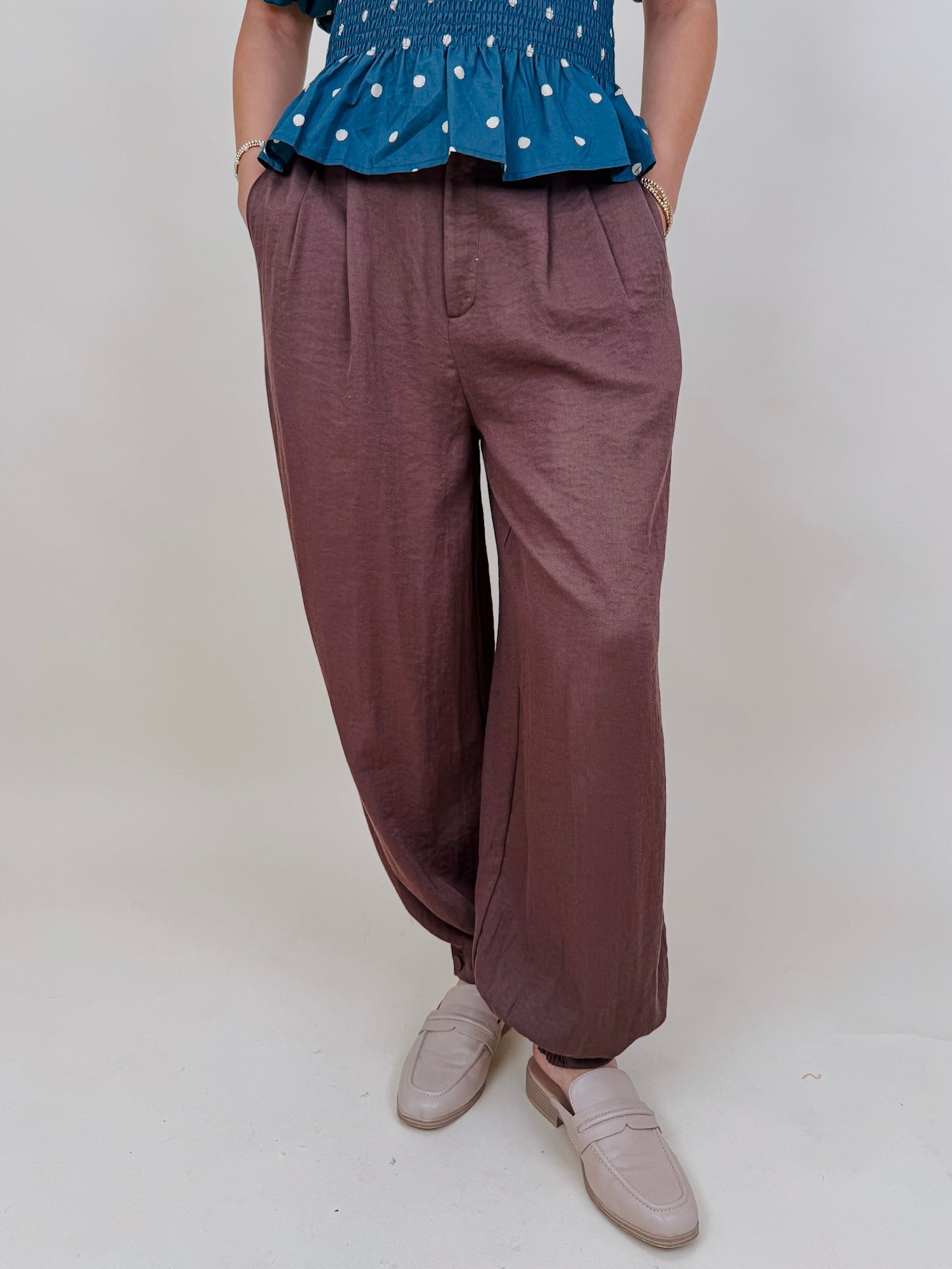 Penny For Your Thoughts Pant in cocoa brown twill with pleated front and smocked ankle cuff — Paper Doll