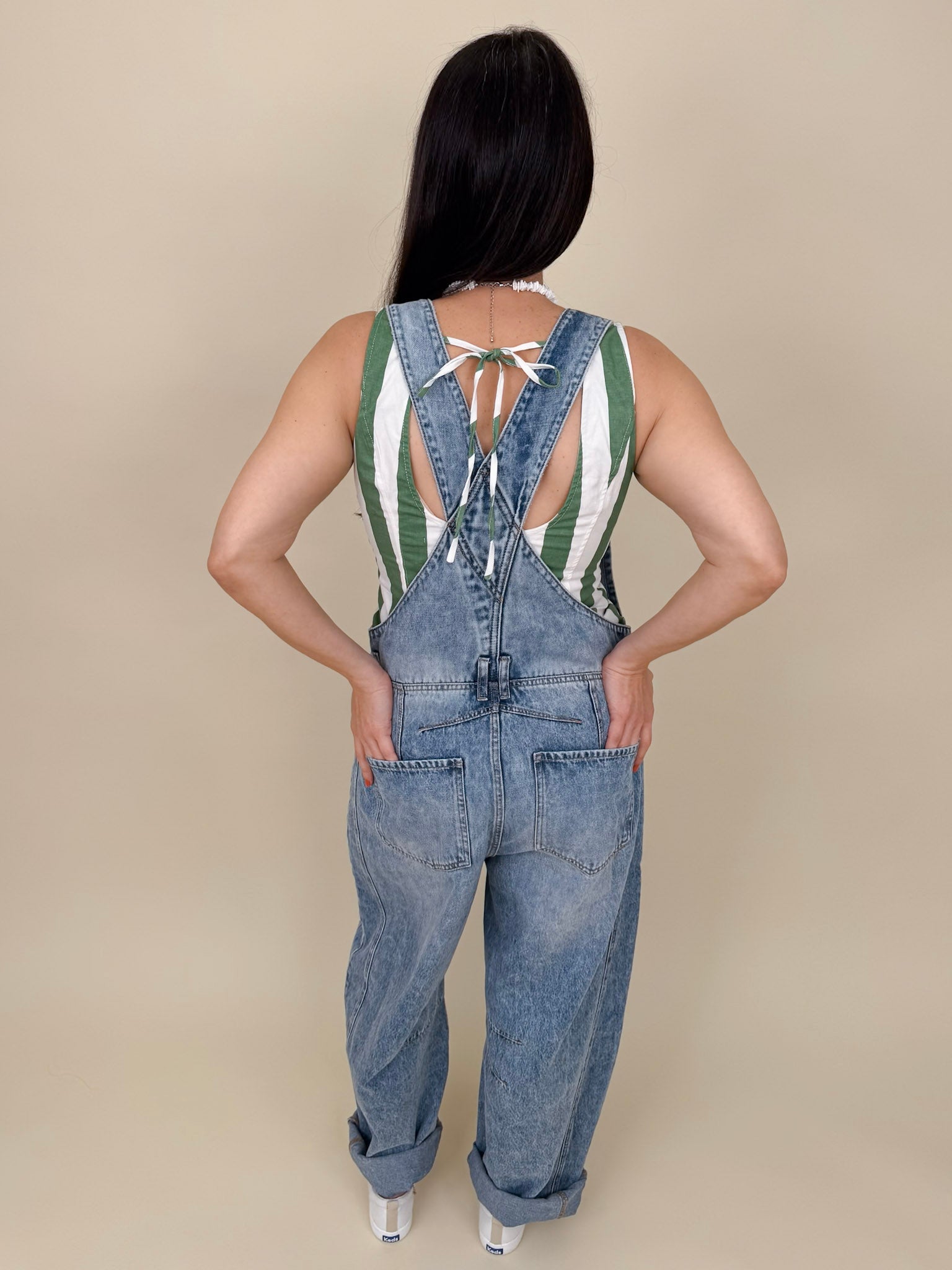 Tracy Barrel Overalls in light acid wash denim with barrel leg and cross-back straps — Paper Doll

