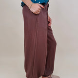 Penny For Your Thoughts Pant in cocoa brown twill with pleated front and smocked ankle cuff — Paper Doll