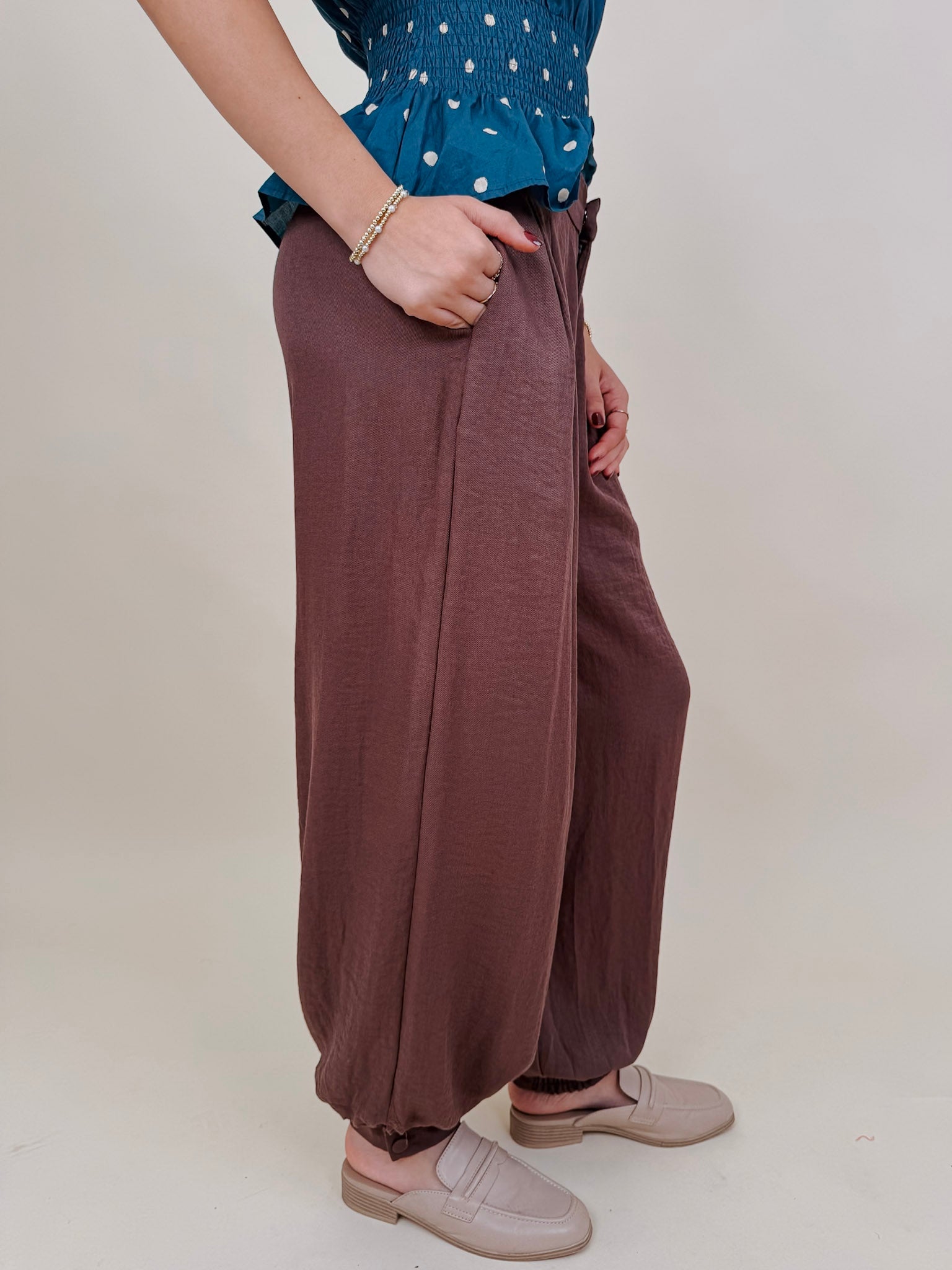 Penny For Your Thoughts Pant in cocoa brown twill with pleated front and smocked ankle cuff — Paper Doll