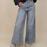 Emery Wide Leg Jeans in vintage light wash denim with patch back pockets — Paper Doll