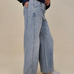 Emery Wide Leg Jeans in vintage light wash denim with patch back pockets — Paper Doll