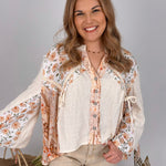Sweet As Honey Floral Button Blouse in cream and peach patchwork with lace trim and balloon sleeves - woman wearing bohemian cotton blouse
