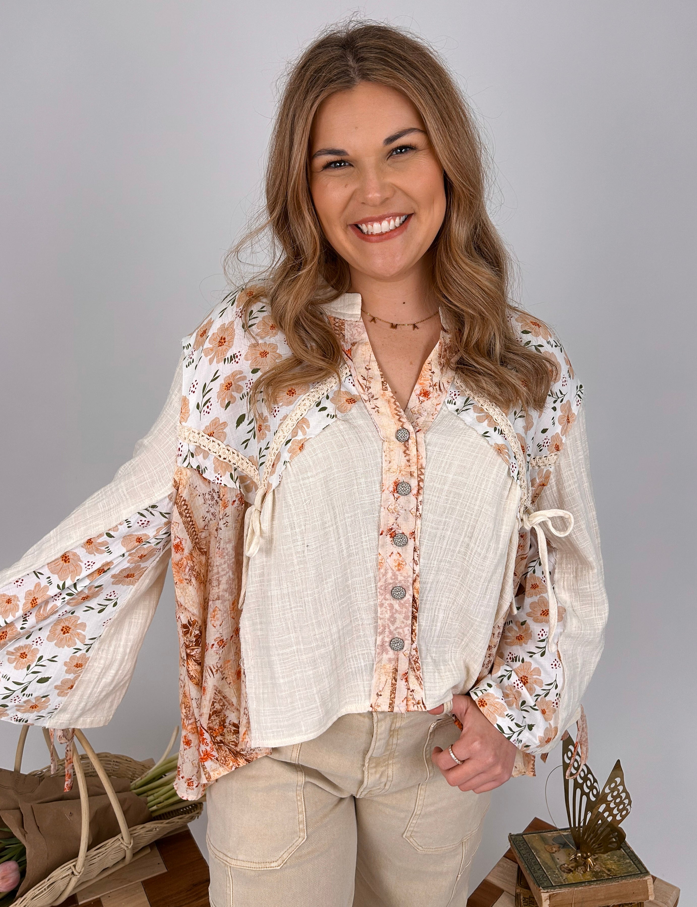 Sweet As Honey Floral Button Blouse in cream and peach patchwork with lace trim and balloon sleeves - woman wearing bohemian cotton blouse