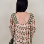 Kace Floral Boho Blouse in cream botanical print with embroidered yoke and smocked ruffle sleeves — Paper Doll
