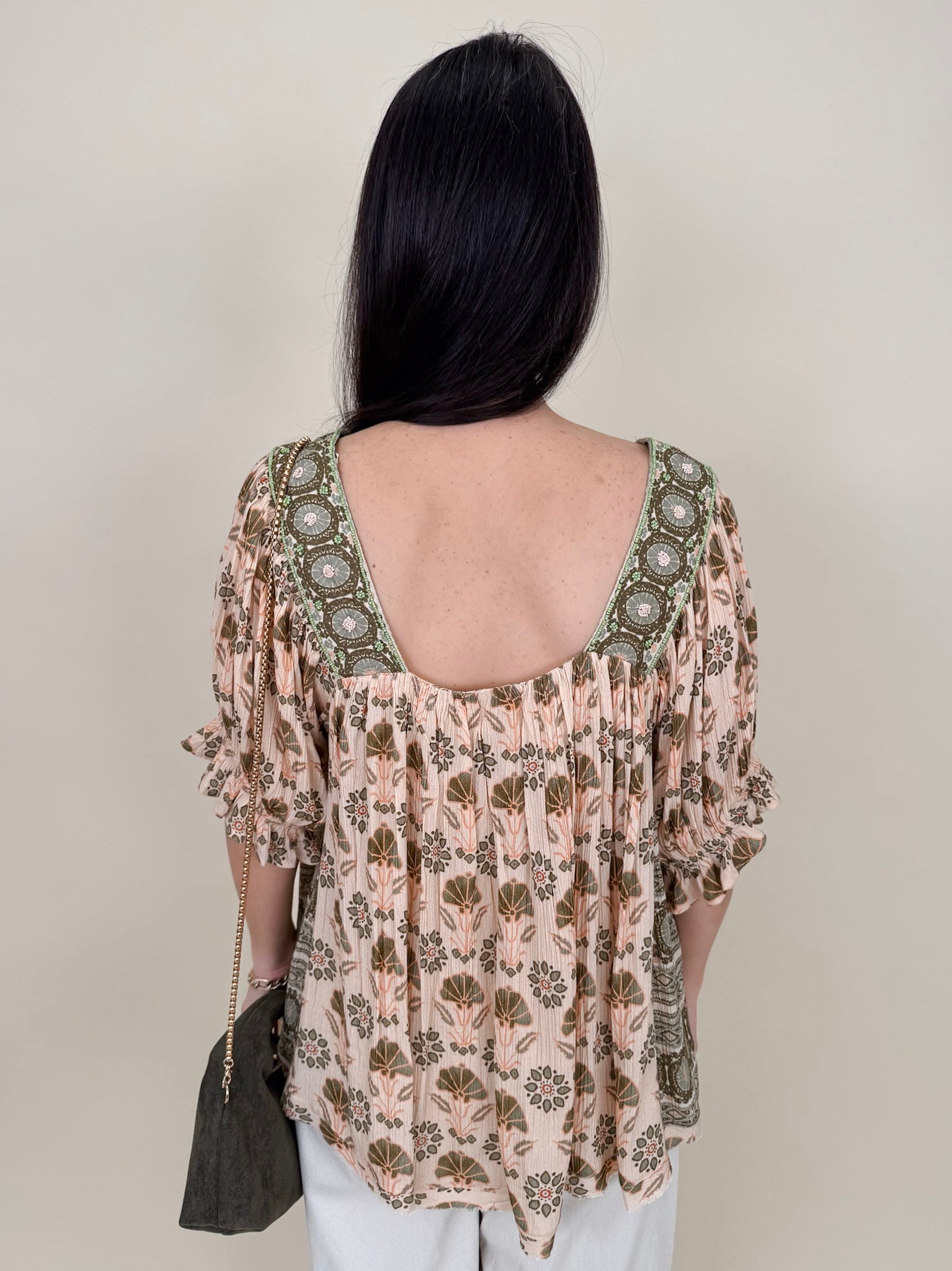 Kace Floral Boho Blouse in cream botanical print with embroidered yoke and smocked ruffle sleeves — Paper Doll
