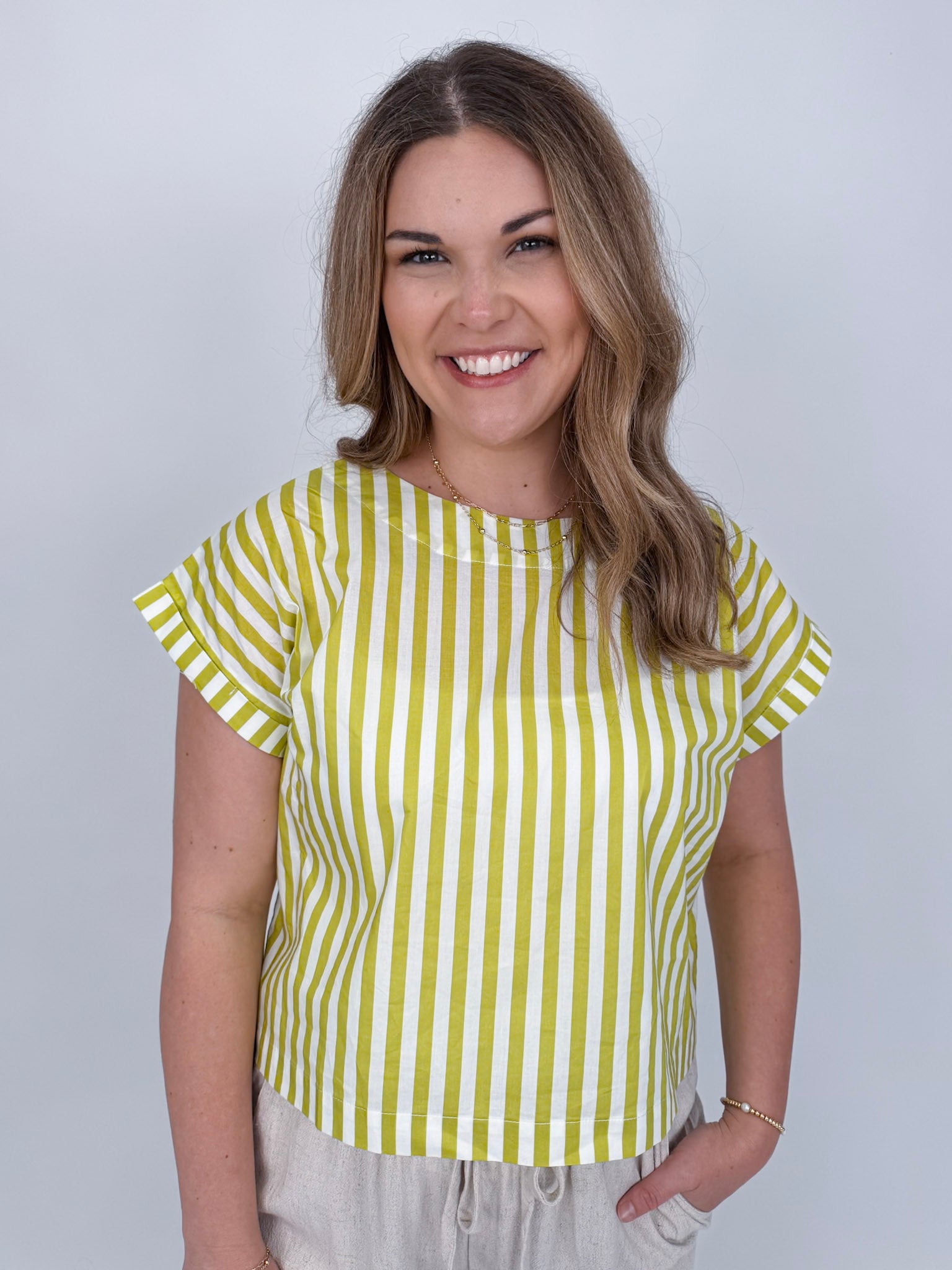 Missy Striped Top in lime green and white stripe with flutter sleeves and button-back closure — Paper Doll
