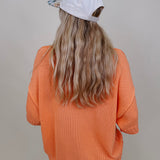 Hilda Oversized Sweater in bright peach with a mock neck and elbow sleeves — Paper Doll
