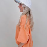 Hilda Oversized Sweater in bright peach with a mock neck and elbow sleeves — Paper Doll
