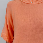 Hilda Oversized Sweater in bright peach with a mock neck and elbow sleeves — Paper Doll
