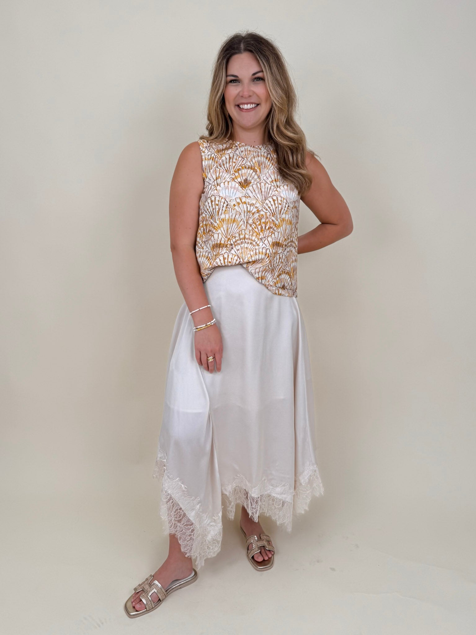 Sandy Seashell Print Top in golden seashell print with buttoned keyhole back — Paper Doll
