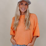 Hilda Oversized Sweater in bright peach with a mock neck and elbow sleeves — Paper Doll

