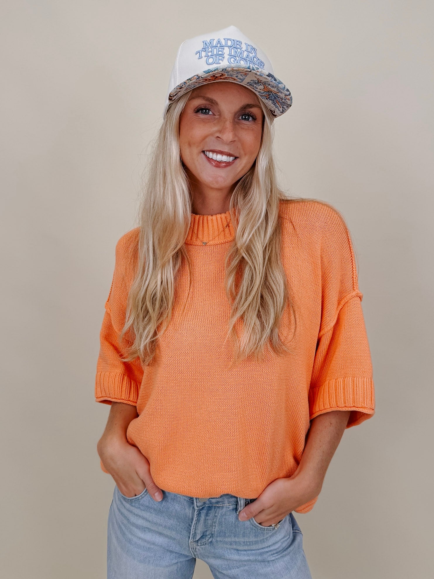 Hilda Oversized Sweater in bright peach with a mock neck and elbow sleeves — Paper Doll
