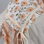 Sweet As Honey Floral Button Blouse in cream and peach patchwork with lace trim and balloon sleeves - woman wearing bohemian cotton blouse