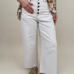 Chrissy Pant in ecru with high-rise waist, exposed button fly, and wide-leg silhouette — Paper Doll
