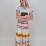Sunset Tiered Maxi Skirt in an ombré sunset stripe of peach, gold, and rust — Paper Doll
