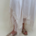 Kara Lace Trim Skirt in ivory satin with eyelash lace asymmetric hem — Paper Doll