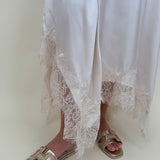 Kara Lace Trim Skirt in ivory satin with eyelash lace asymmetric hem — Paper Doll