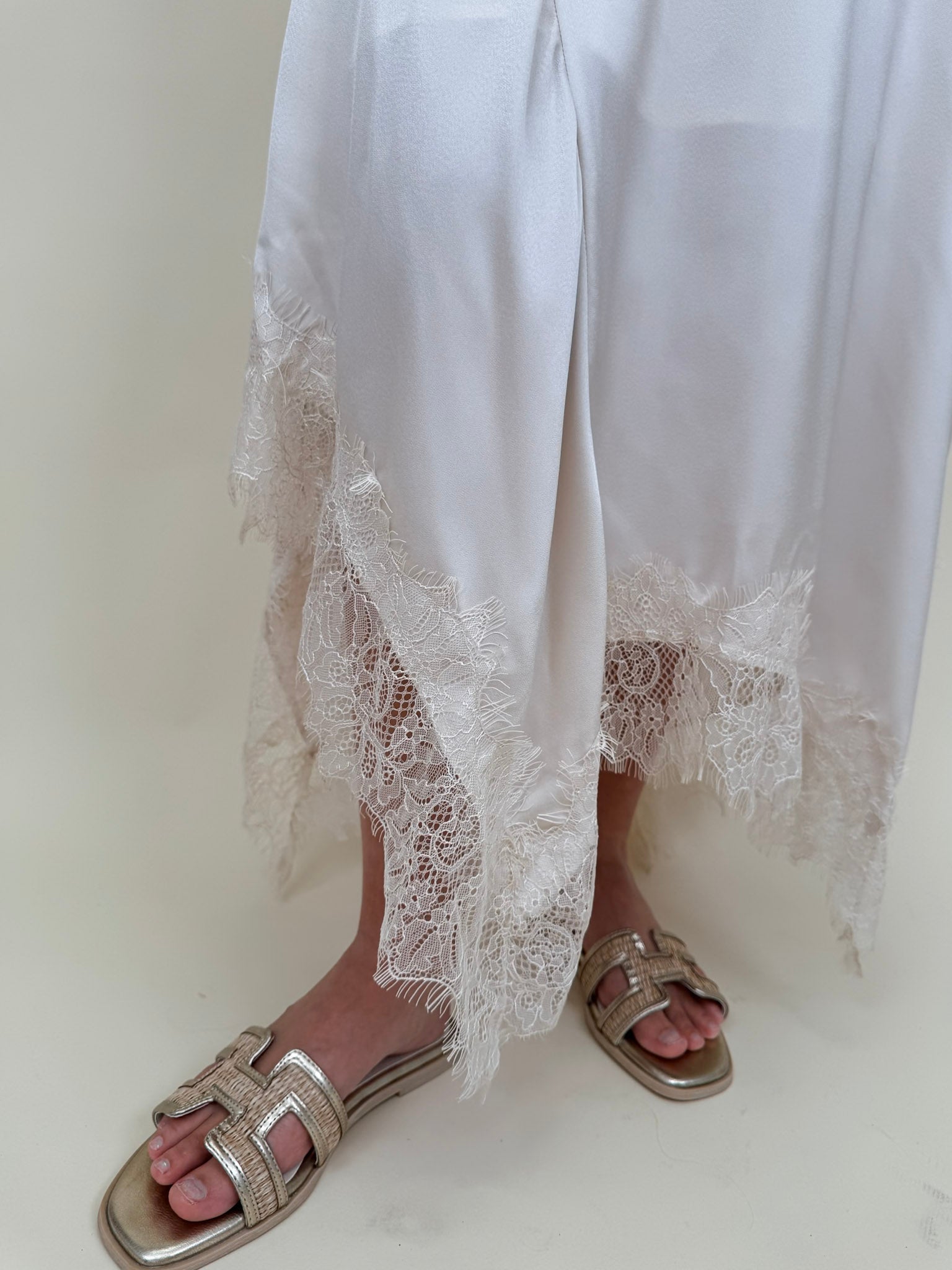 Kara Lace Trim Skirt in ivory satin with eyelash lace asymmetric hem — Paper Doll