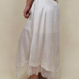 Kara Lace Trim Skirt in ivory satin with eyelash lace asymmetric hem — Paper Doll