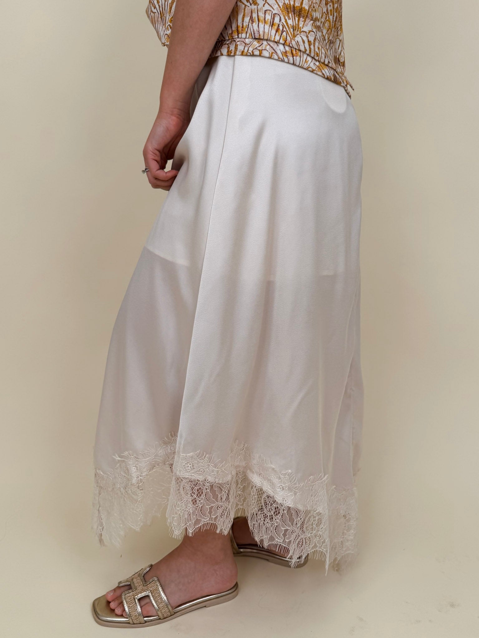 Kara Lace Trim Skirt in ivory satin with eyelash lace asymmetric hem — Paper Doll