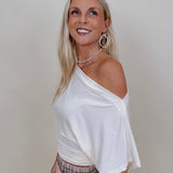 Tara Draped Sleeve Blouse in cream with an off-shoulder neckline and draped sleeves — Paper Doll
