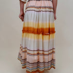 Sunset Tiered Maxi Skirt in an ombré sunset stripe of peach, gold, and rust — Paper Doll
