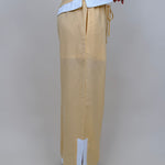 Walking At Sunset Top in lemon yellow with cross-halter neckline and white contrast trim — Paper Doll
