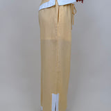 Walking At Sunset Top in lemon yellow with cross-halter neckline and white contrast trim — Paper Doll
