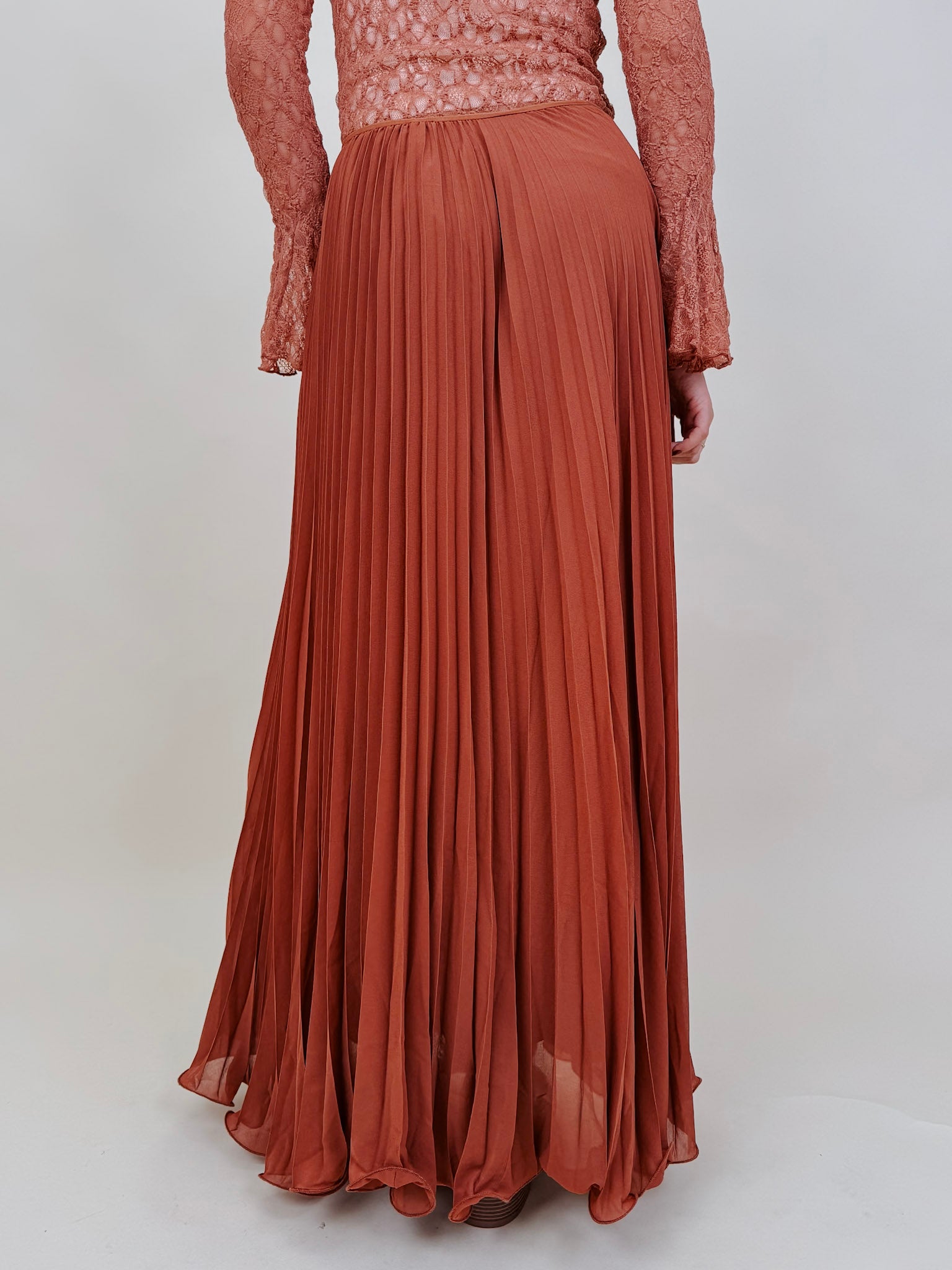 Flora Maxi Skirt in rust accordion pleated polyester — Paper Doll