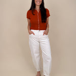 Stay Cool Sweater Top with pearl button front closure and short sleeve knit silhouette — Paper Doll