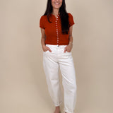 Stay Cool Sweater Top with pearl button front closure and short sleeve knit silhouette — Paper Doll