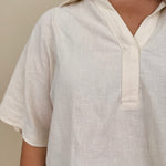 Galilea Oversized Open Collar Top in cream with relaxed collar and boxy fit — Paper Doll