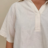 Galilea Oversized Open Collar Top in cream with relaxed collar and boxy fit — Paper Doll