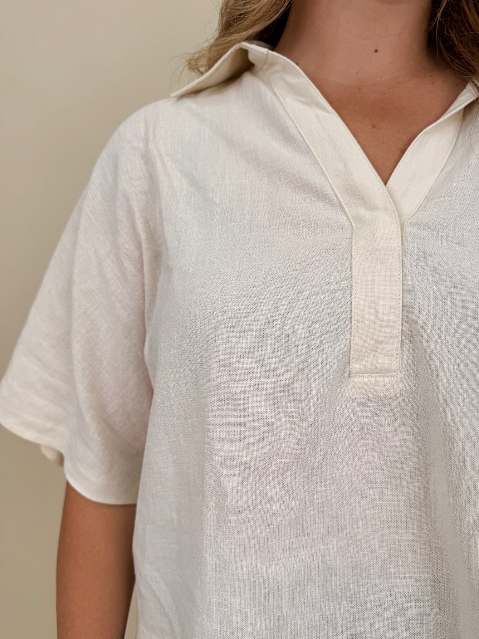 Galilea Oversized Open Collar Top in cream with relaxed collar and boxy fit — Paper Doll