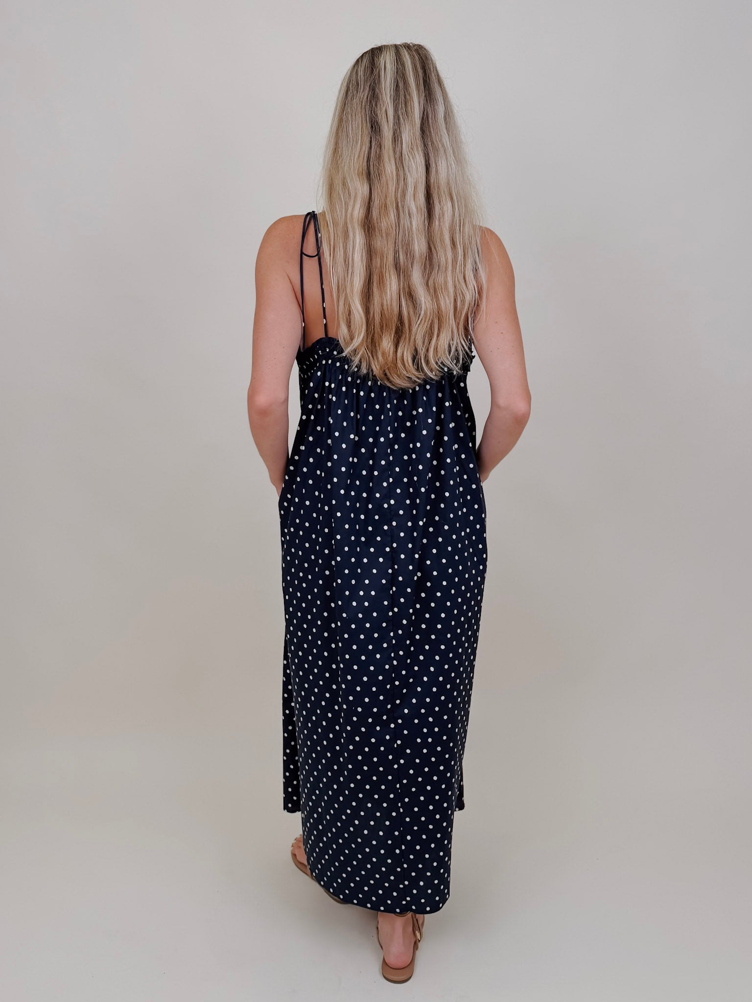 Kerry Polka Dot Midi Dress in navy with white polka dots and tie straps — Paper Doll
