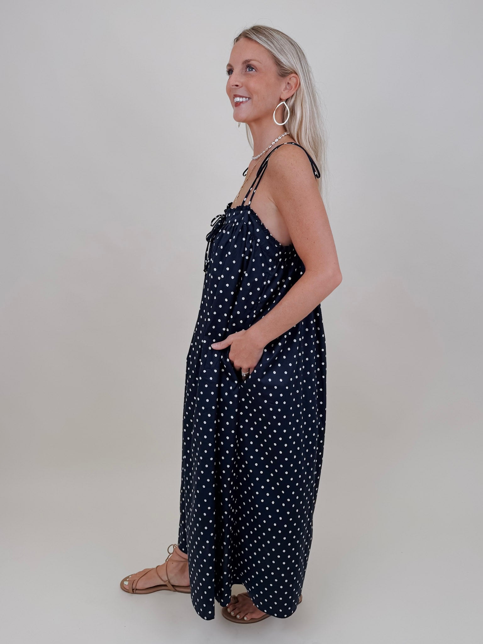 Kerry Polka Dot Midi Dress in navy with white polka dots and tie straps — Paper Doll
